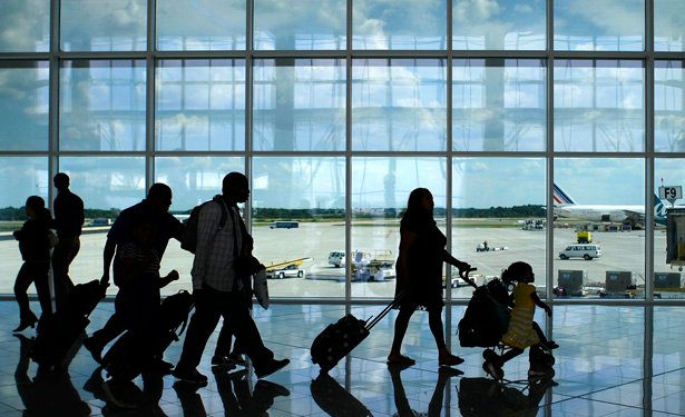 Passengers walk through the newly opened Maynard H. Jackson Jr. International Terminal in Atlanta, Georgia